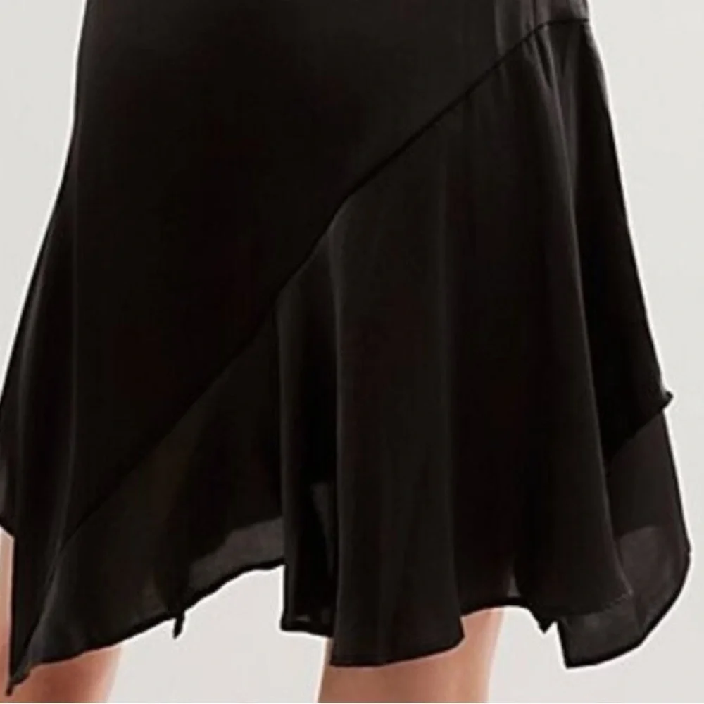 Free People size 6 Slim Shine black asymmetrical silky feel mid-rise short skirt